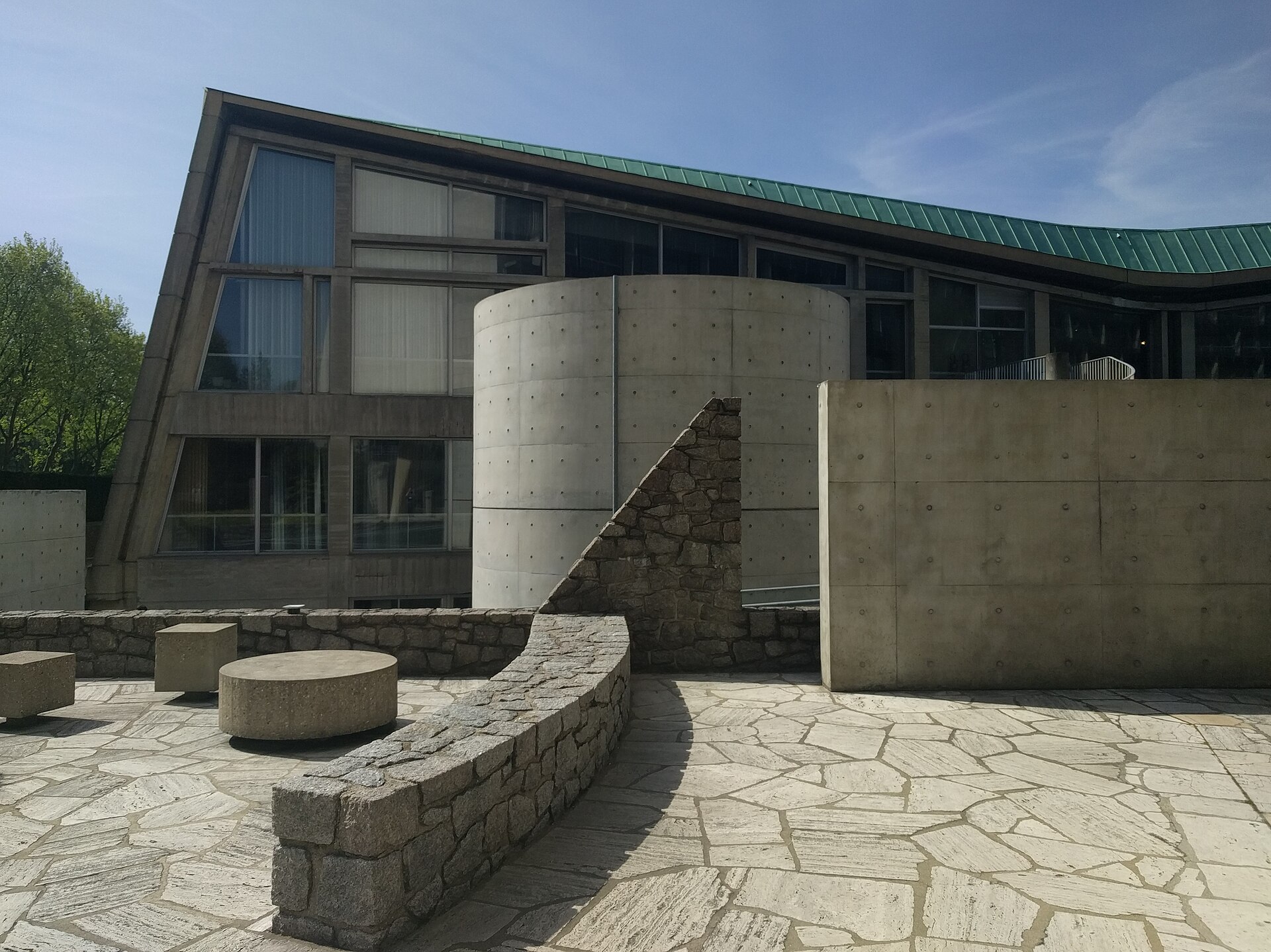 Dark concrete architecture with quiet natural light